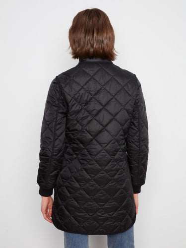 Versatile black coat featuring convenient side zippers that allow easy adjustments for comfort while maintaining an elegant appearance by Charlie B.