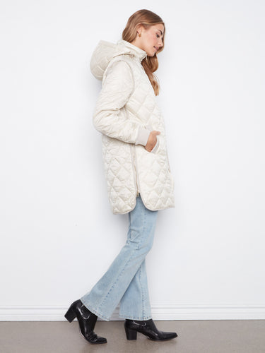 Elegant coat with ribbed knit details, enhancing the overall cozy look by Charlie B.