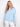 Light blue scuba top with a crew neckline, featuring intricate soutache detailing on the sleeves. Relaxed fit by Charlie B.