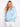 Long sleeve light blue top with drop shoulders and elegant soutache detail. Crew neckline adds charm by Charlie B.