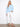Chic light blue long sleeve top with drop shoulders and charming soutache embellishments. Crew neck style by Charlie B.