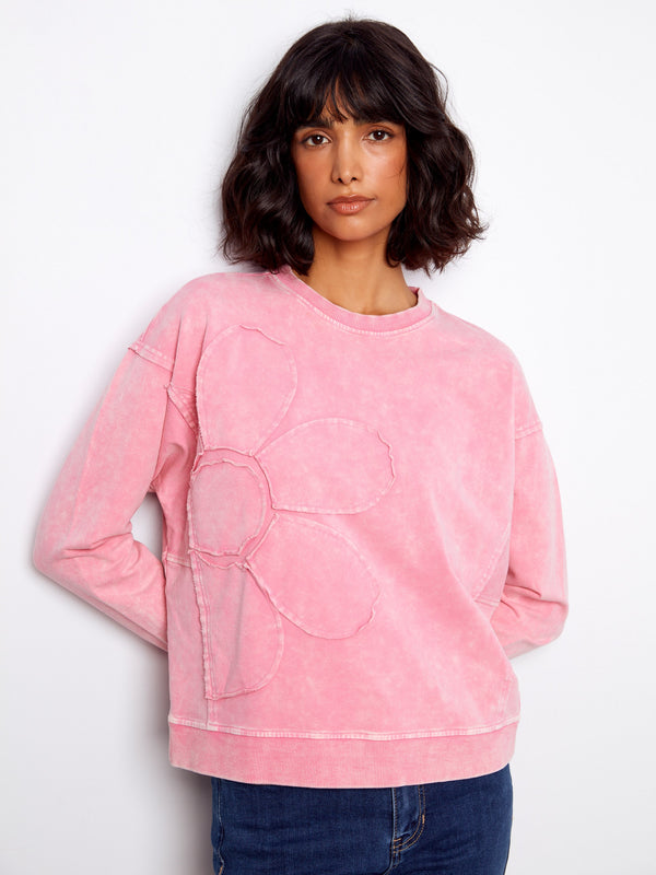 Pink sweatshirt featuring a crew neckline with ribbed detailing, offering a relaxed fit and casual style by Charlie B.