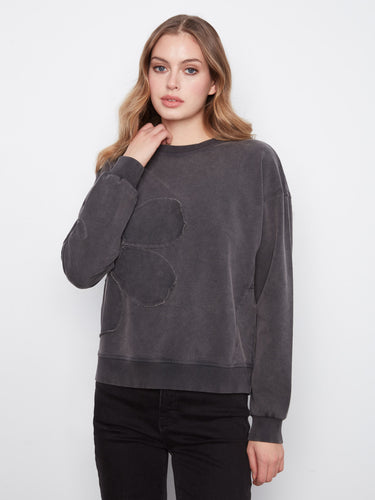 Stylish charcoal top in stretch cotton with crew neckline and floral applique by Charlie B.
