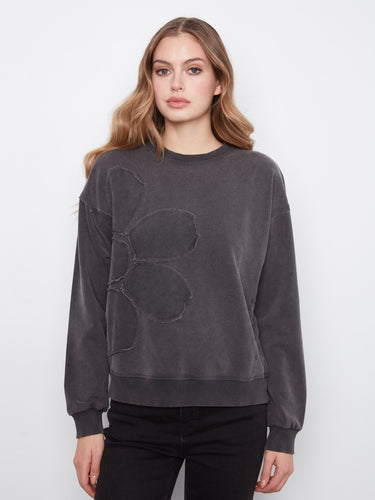 Chic charcoal long sleeve with drop shoulders and distinct flower design by Charlie B.