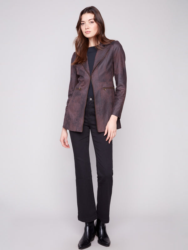 Mocha jacket with a hook-and-eye closure, adding elegance to the faux suede texture and zipper pockets by Charlie B.