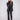 Black faux suede jacket with hook-and-eye closure, offering a sleek and polished look for any occasion by Charlie B.