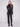 Black faux suede jacket with hook-and-eye closure, offering a sleek and polished look for any occasion by Charlie B.