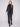 Stylish faux suede jacket in black with two front zipper pockets, ideal for keeping essentials close by Charlie B.