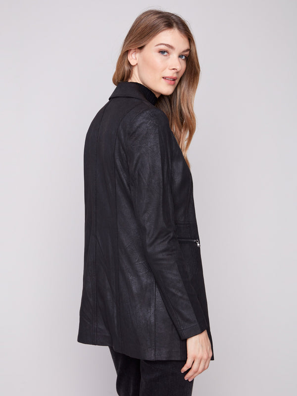 Chic black jacket showcasing a vintage-inspired texture, adding depth and style to your outfit by Charlie B.