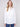 Crisp white poplin shirt designed with button cuffs and long sleeves for added elegance by Charlie B.