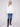 White long-sleeve poplin shirt with chest pockets and button-up front by Charlie B.