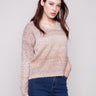 Latte-colored V-neck sweater featuring drop shoulders and a textured knit for a relaxed fit by Charlie B.
