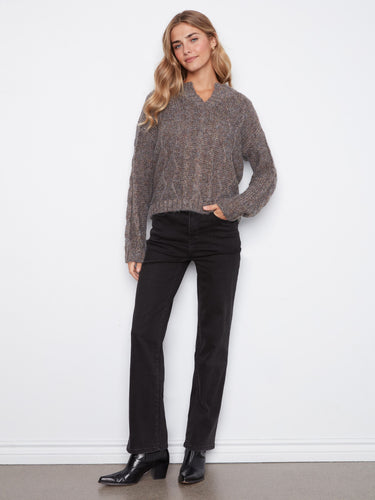Cable knit sweater featuring a cozy drop shoulder design by Charlie B.