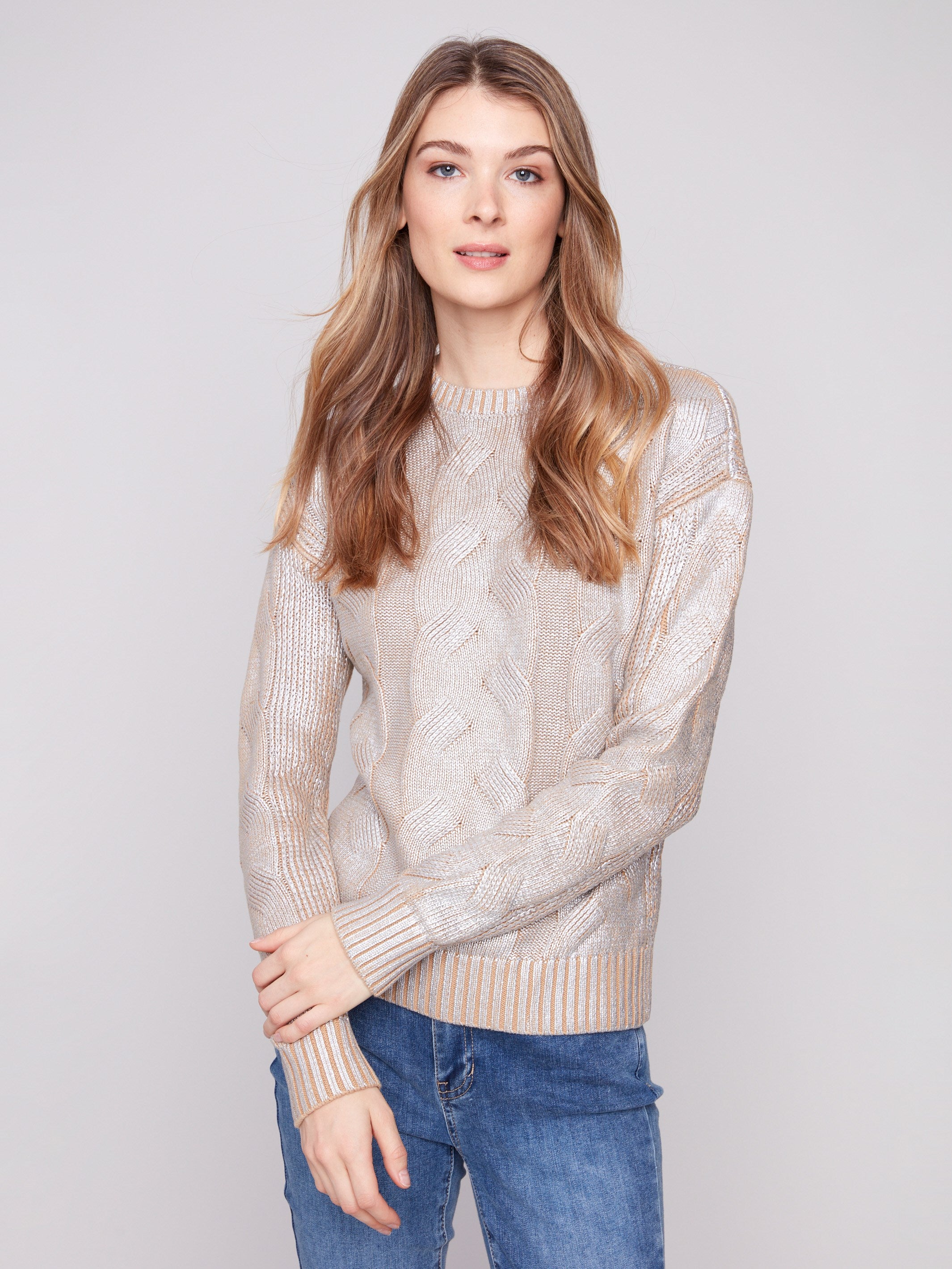 Elegant cable knit sweater in silver metallic with a classic crew neck, crafted from 100% cotton by Charlie B.