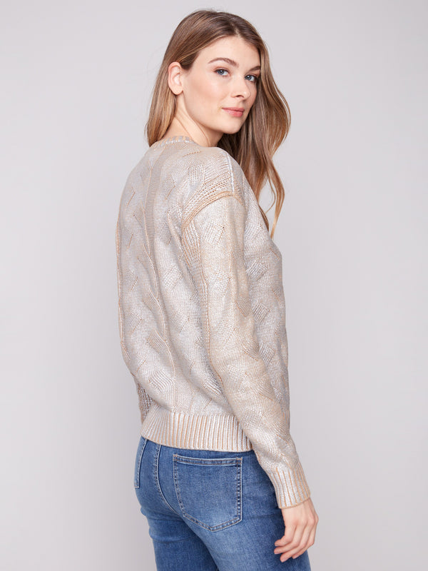 Classic crew neck sweater with intricate cable patterns and a luxurious metallic sheen by Charlie B.