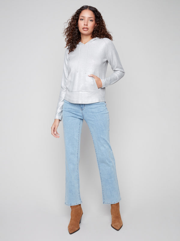 This sweater features raglan sleeves for added comfort and style, making it a must-have by Charlie B.