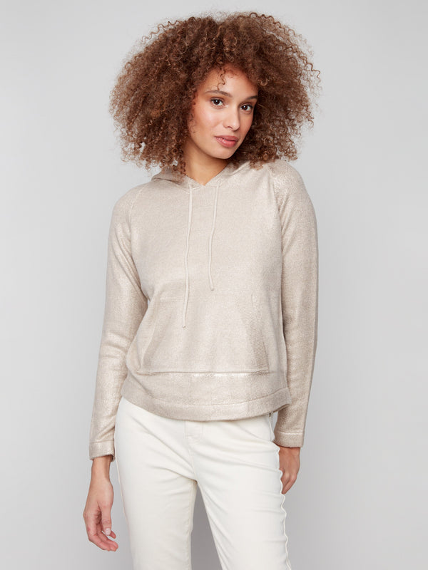 Practical front pocket adds functionality to the elegant design of this metallic knit hoodie by Charlie B.