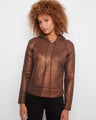 Copper sweater with a metallic finish and kangaroo pocket, designed for style and comfort. Perfect for any casual outing by Charlie B.
