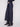 Stylish cropped length blue black jeans with back pockets and a chic metallic finish by Charlie B.