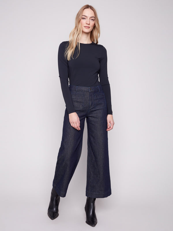 Fashionable flare fit blue black jeans with subtle metallic detailing for an elegant touch by Charlie B.