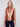 Copper metallic vest featuring two side pockets for convenience by Charlie B.