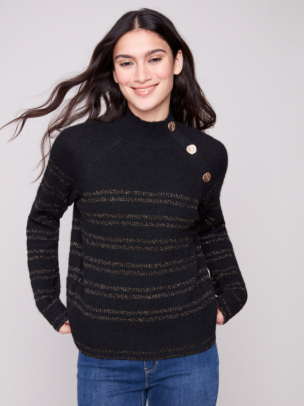 Elegant black sweater featuring a mock neck and raglan sleeves, adorned with metallic stripes for a chic look by Charlie B.