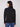 Sophisticated black sweater showcasing raglan sleeves and subtle gold stripes for a refined style by Charlie B.