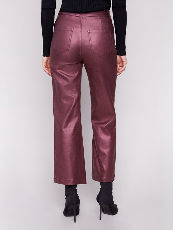 Mid-rise design enhances these cabernet metallic flared pants, adding sophistication to any outfit by Charlie B.
