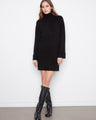 Elegant black sweater dress with a mock neck, perfect for a chic look. The long raglan sleeves add sophistication by Charlie B.
