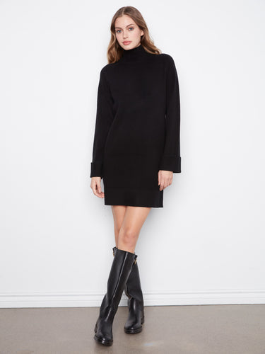 Elegant black sweater dress with a mock neck, perfect for a chic look. The long raglan sleeves add sophistication by Charlie B.