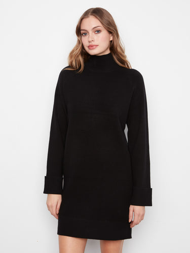 Timeless black sweater dress featuring a sleek mock neck and elegant design elements that elevate your fashion game by Charlie B.