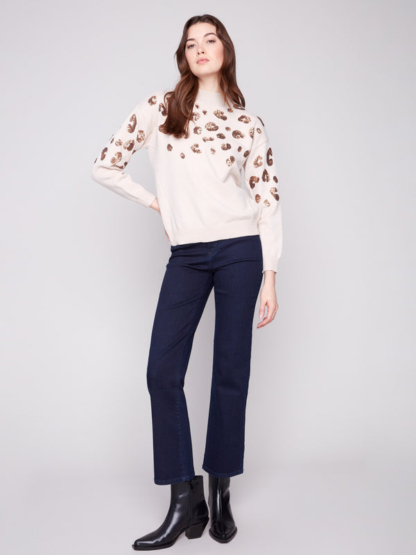 Long sleeve design ensures warmth and style for any season by Charlie B.