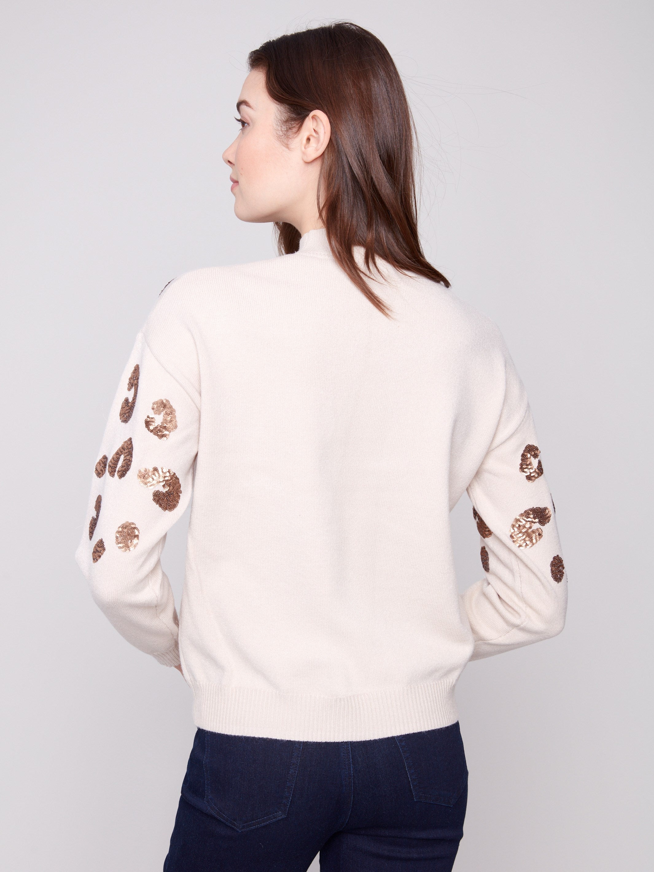 Crafted from a luxurious wool fabric blend, offering comfort and elegance by Charlie B.