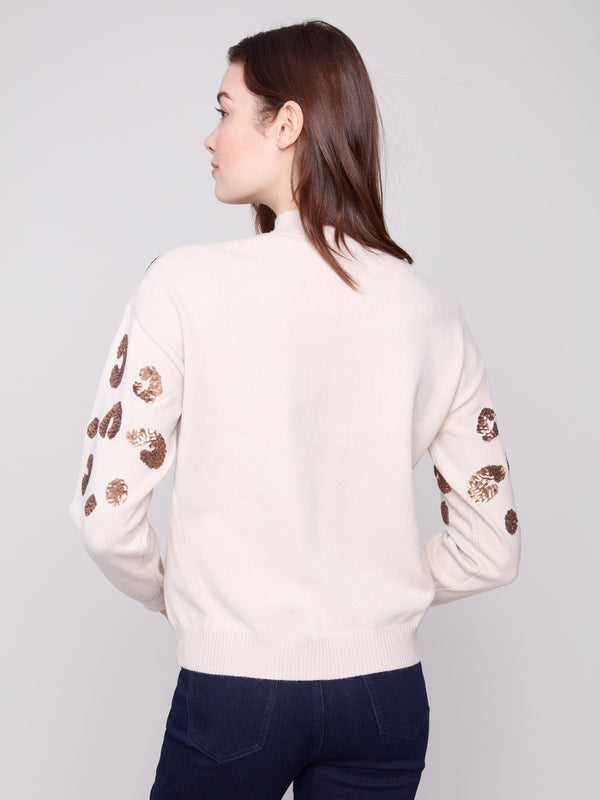 Crafted from a luxurious wool fabric blend, offering comfort and elegance by Charlie B.