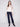 Perfect for layering, this sweater features long sleeves and stylish accents by Charlie B.
