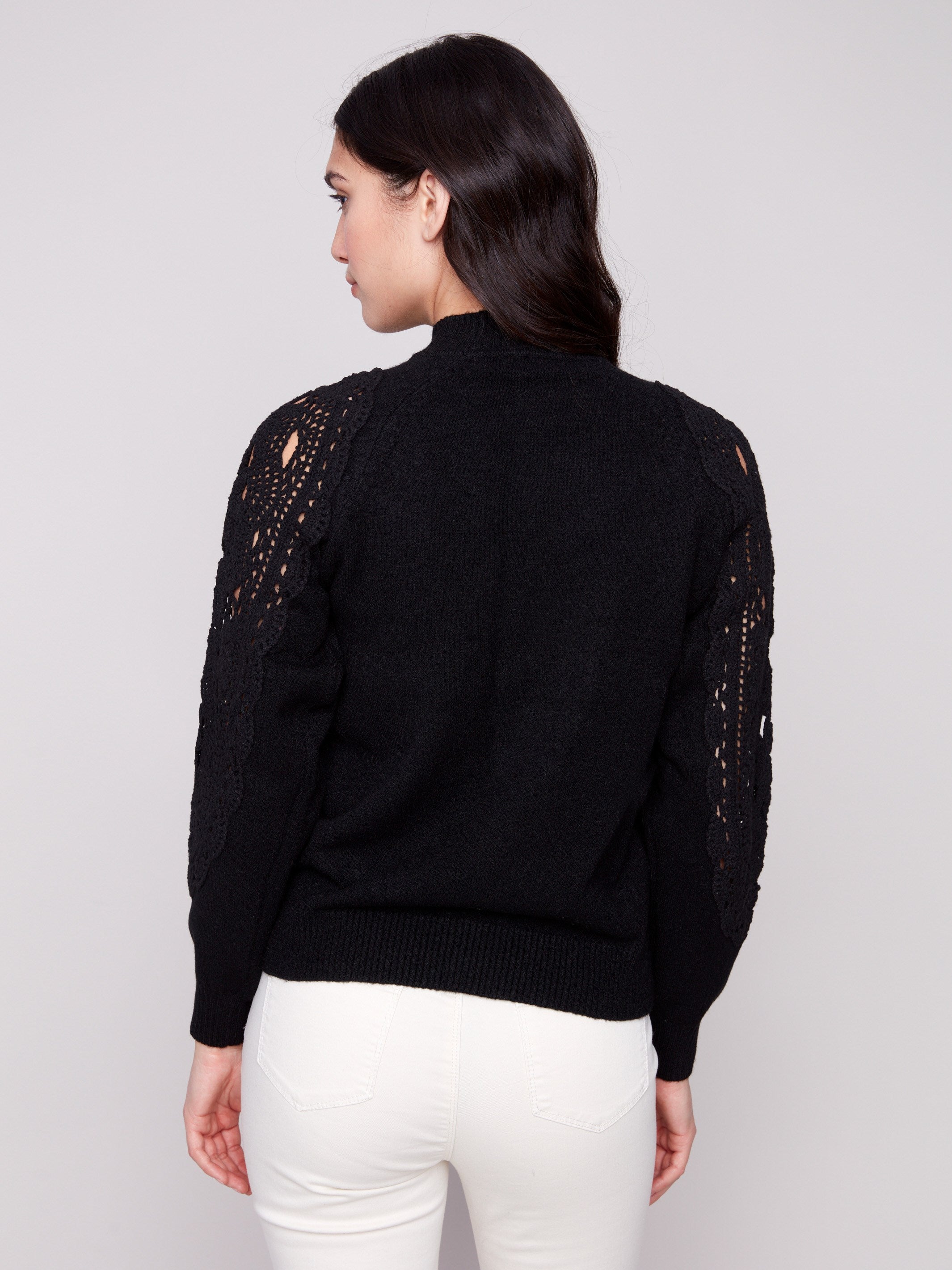 Chic design showcasing delicate crochet details, making it a versatile wardrobe staple by Charlie B.