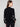 Comfortable and fashionable drop shoulder design in this black sweater, adorned with white hearts by Charlie B.
