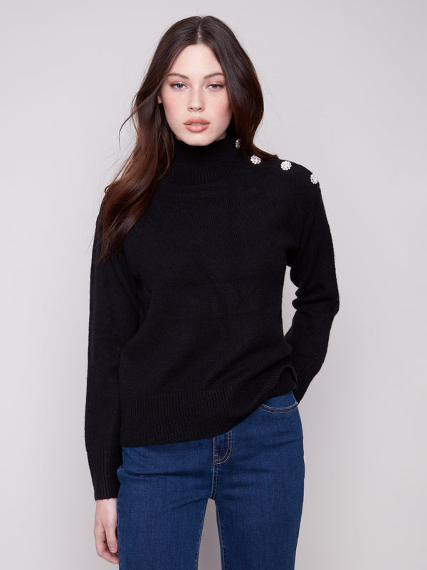 Elegant black sweater with a mock neck and stylish ribbed cuffs, perfect for any occasion by Charlie B.