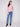 Elegant sweater with fancy buttons at the neck, crafted in a heather primrose hue by Charlie B.