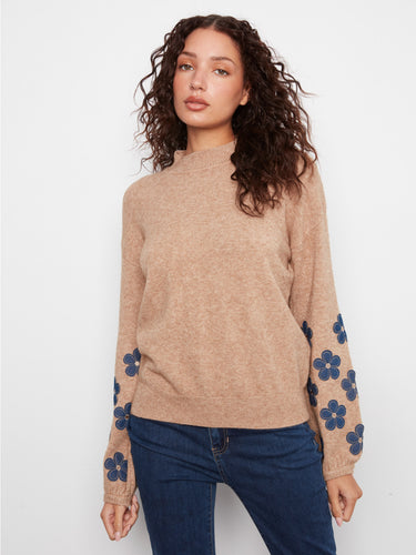 Sweater featuring a cozy mock neck and elegant design, enhanced by Charlie B.