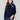 Navy sweater with mock neck and stylish open sleeve cuffs, perfect for a chic look by Charlie B.
