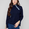 Navy sweater with mock neck and stylish open sleeve cuffs, perfect for a chic look by Charlie B.