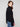 Chic black sweater highlighted by contrast crochet detailing on sleeves by Charlie B.