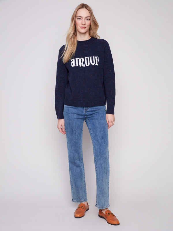 Stylish navy sweater with mock neck and bold 'amour' print in a cozy flecked yarn finish by Charlie B.