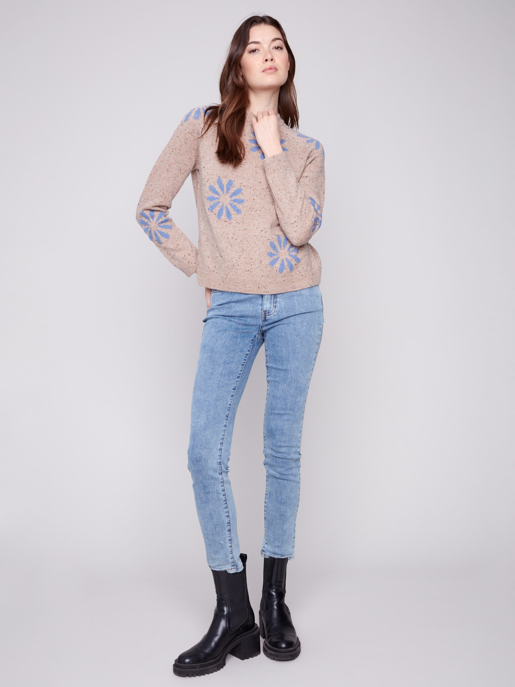 Mock neck sweater featuring a charming blue floral design and long sleeves by Charlie B.