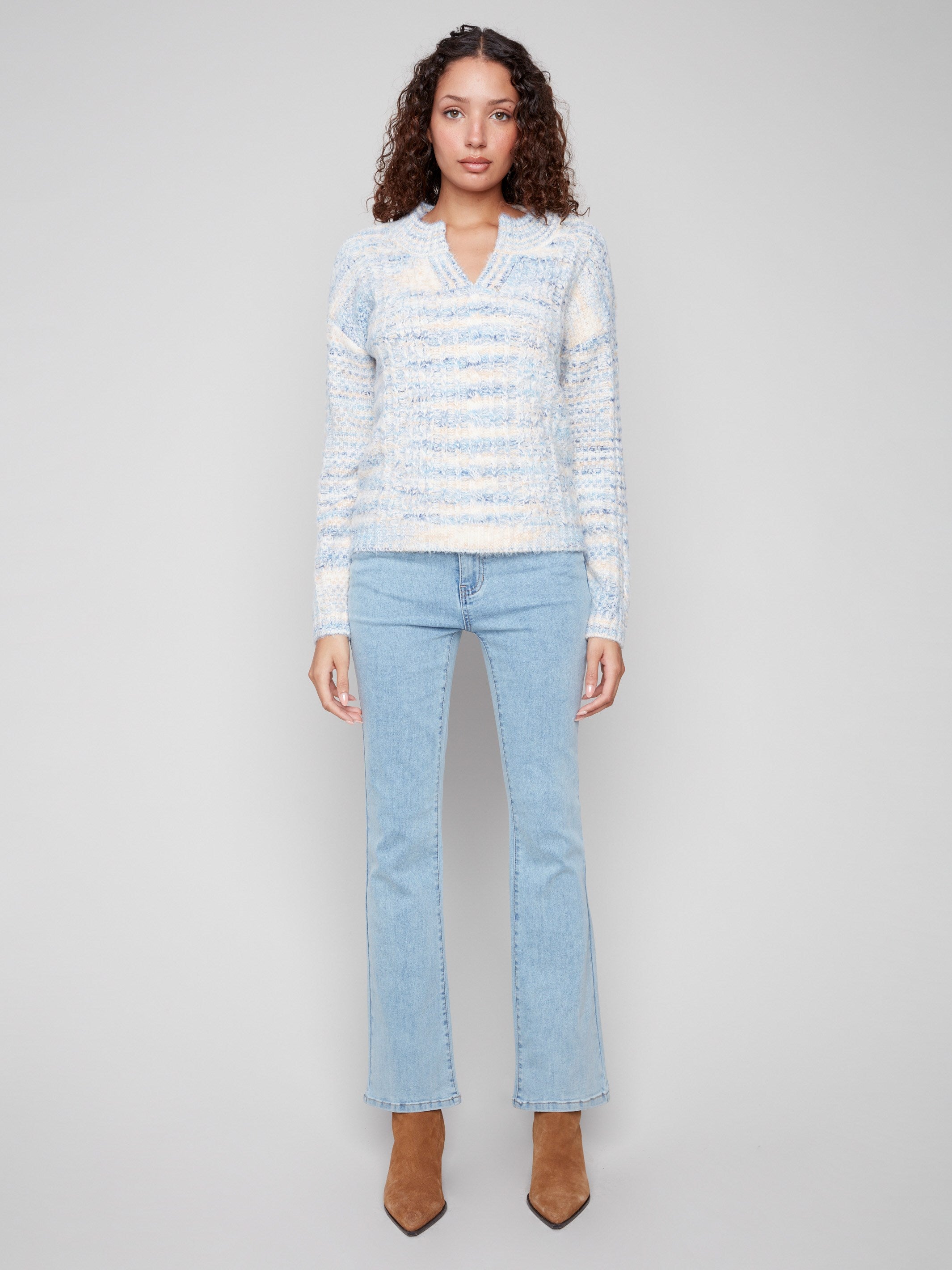 Striped pattern sweater with a stylish drop shoulder design, offering a relaxed and comfortable fit by Charlie B.