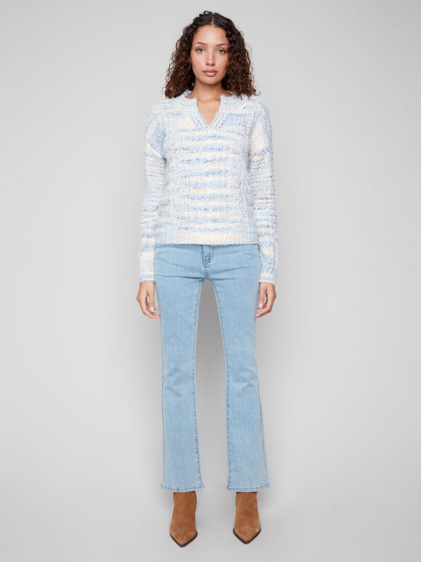 Striped pattern sweater with a stylish drop shoulder design, offering a relaxed and comfortable fit by Charlie B.