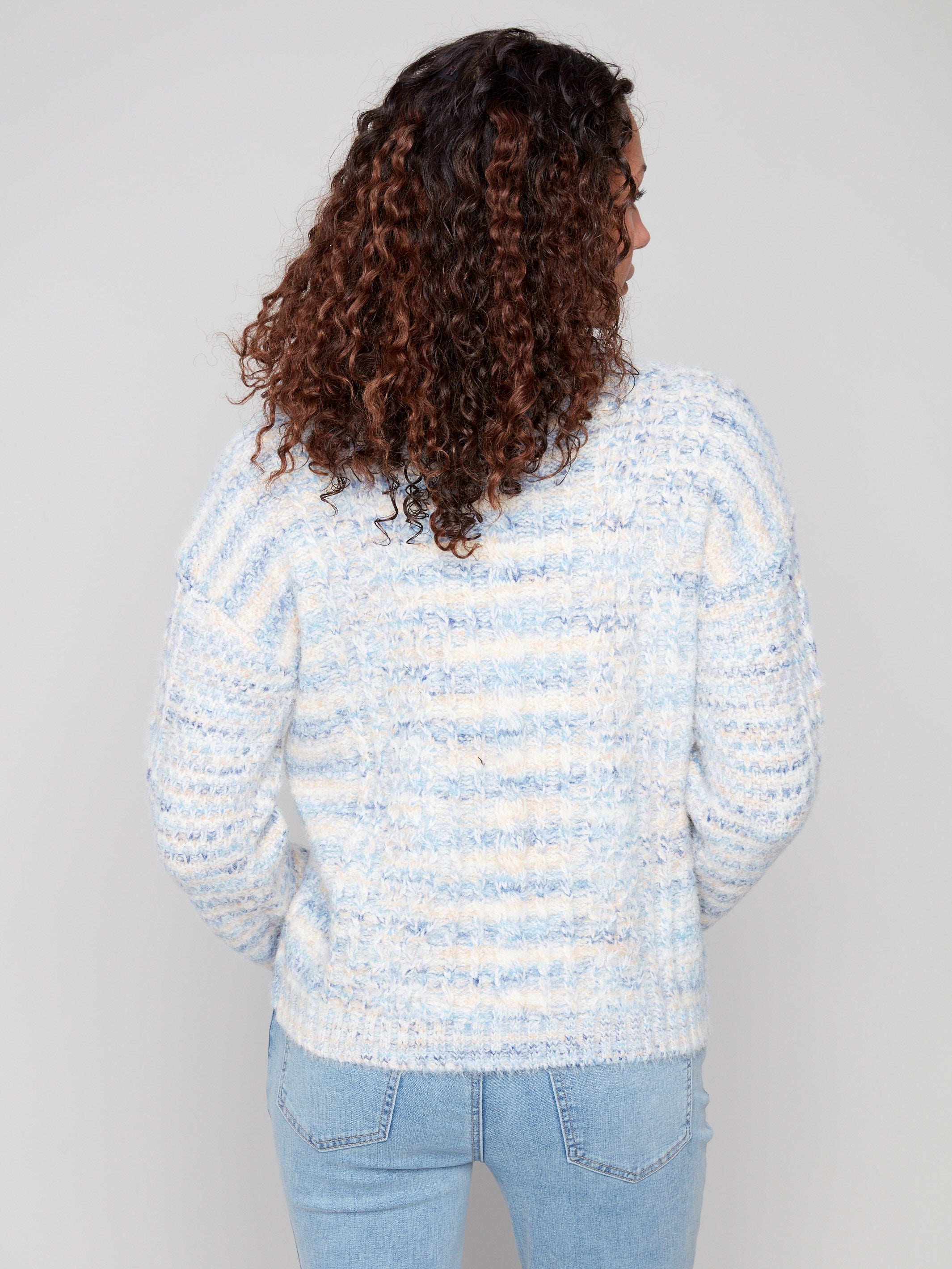 Soft striped sweater crafted from luxurious eyelash yarn, ideal for adding warmth and texture to your wardrobe by Charlie B.