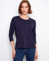 Elegant top featuring a classic crew neckline, perfect for casual outings. Designed for comfort and style by Charlie B.