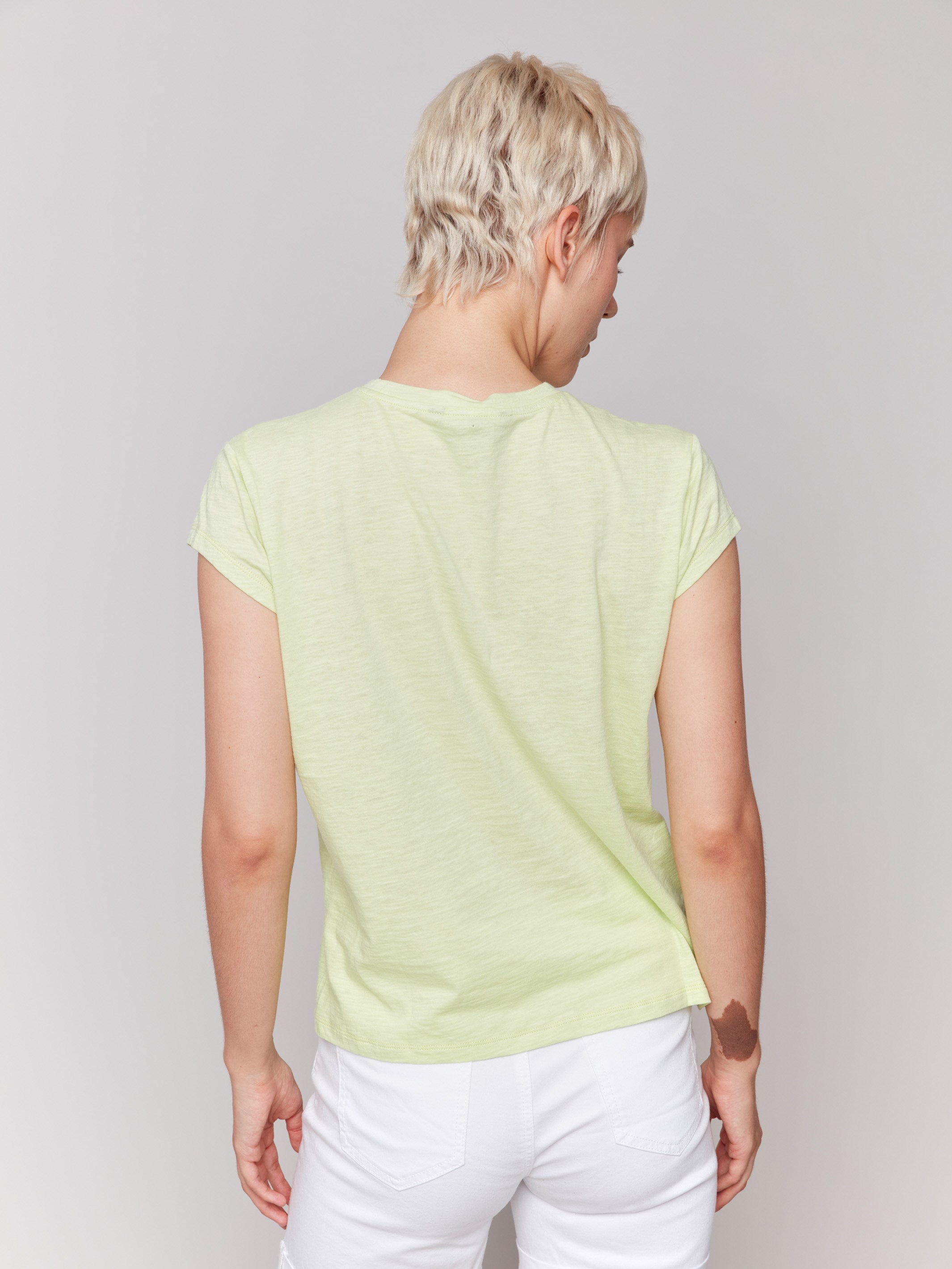 Cap sleeve keylime tee highlighting a classic crew neckline by Charlie B.